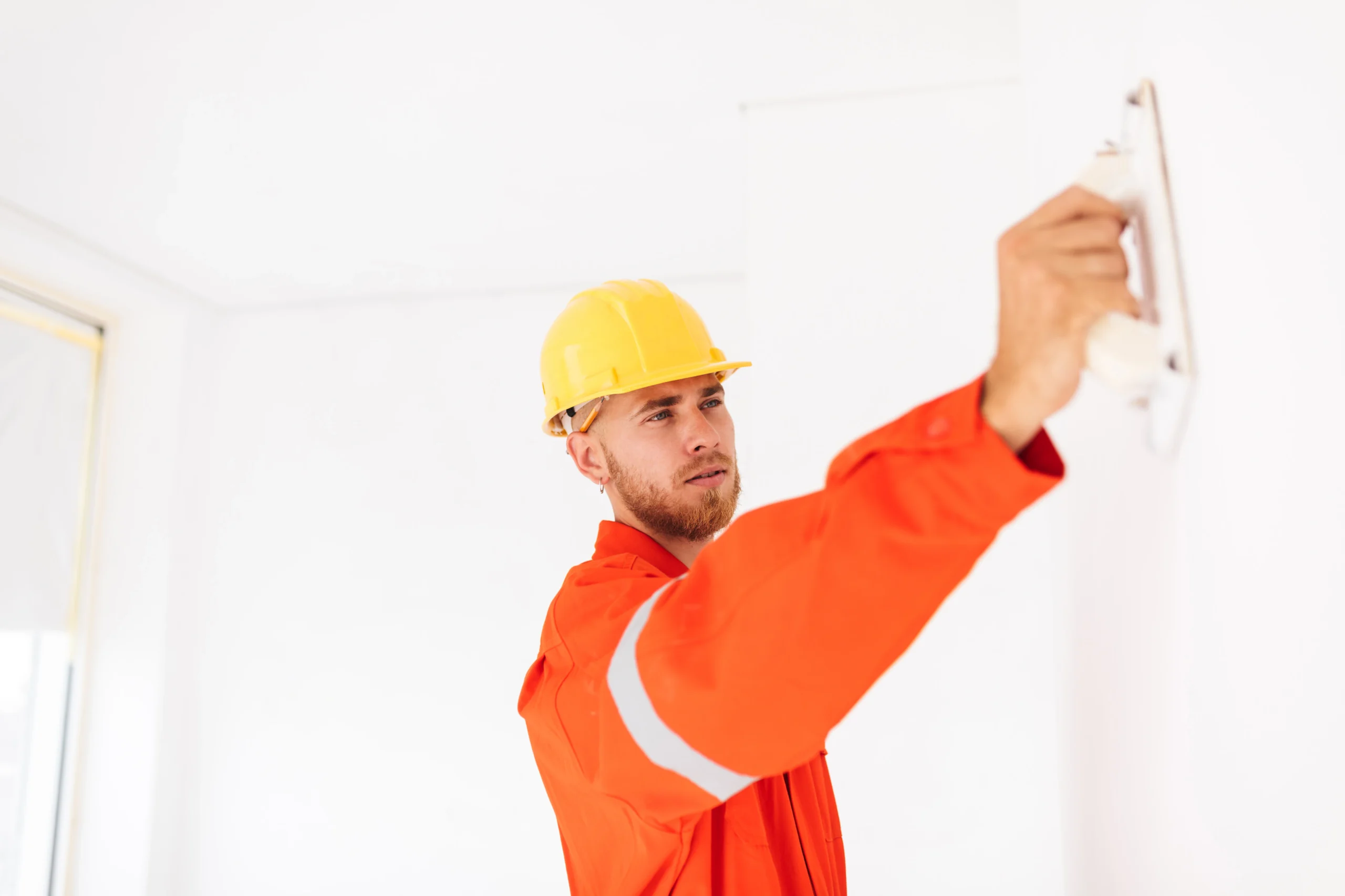 Drywall finisher applying joint compound